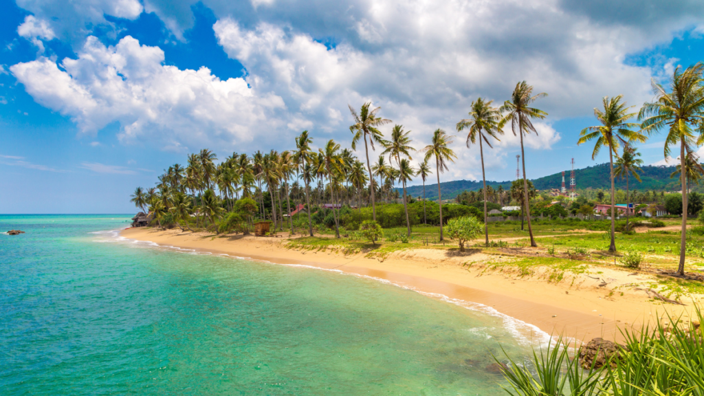 View of crystalline water and golden sand at Klong Khong Beach