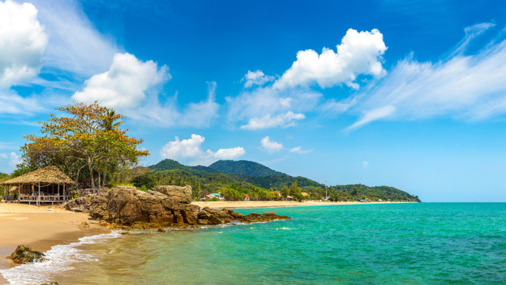 Gorgeous blue-green water on a perfect day at Klong Nin Beach